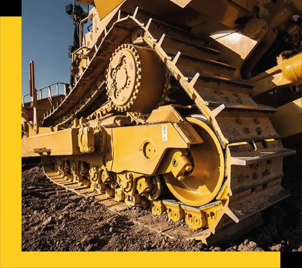 Sistema de orugas de maquinaria Caterpillar equipado con repuestos especializados para tracción y soporte.